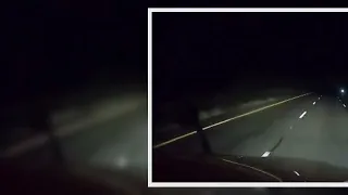 Truck driver captures mysterious ghost figure standing in dark highway roadside