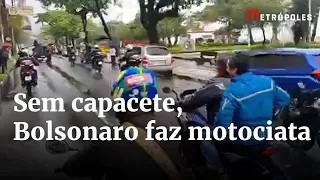 Com chuva e sem capacete, Bolsonaro faz motociata em São Paulo