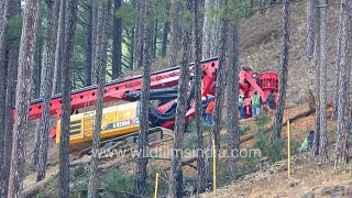 Heavy machinery going up the mountain during rescue mission at Sikyara Bend, Barkot Road tunnel