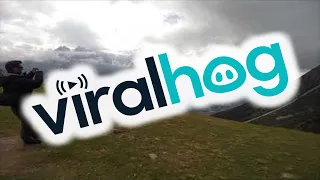 Helicopter Rescues Paraglider in French Alps || ViralHog