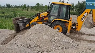 Gravel Collection for Road Construction-JCB Backhoe Loader-Leveling it