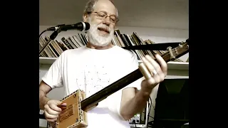 Travelling Riverside Blues on a 3 string fretless cigar box guitar