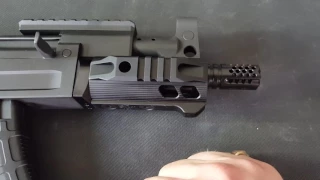 C39 Micro with SLR handguard and Mini Comp vs. Troy P7A1