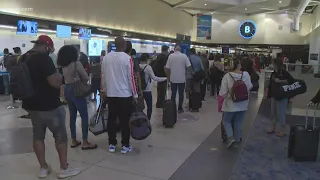 'It's ridiculous': Passengers stuck at Charlotte airport after American cancels flights