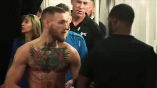 Conor McGregor &Tyron Woodley react to their intense moment at weigh-ins