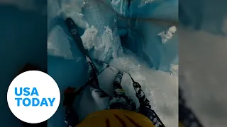 Scary moment a skier falls down the crevasse in French Alps | USA TODAY