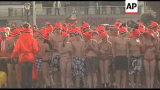 Thousands of people take part in annual winter swim