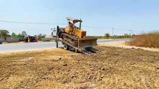 Starting New Project Filling Land With Komatsu D31P Bulldozer Pushing Dirt Into The Canal