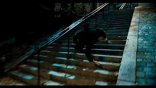 John Wick falls down the stairs