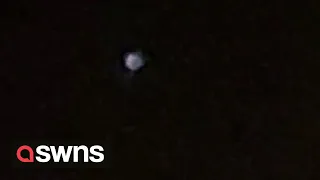 Dog walker captures mysterious doughnut-shaped UFO above UK skies | SWNS