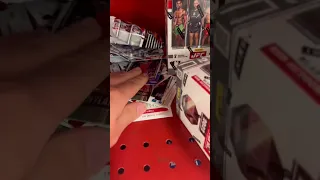 People stealing sports cards and sleeves