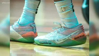 High school star Mike Miles gives 'Kobe Bryant' sneakers to young fan from opposing team