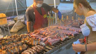 German Street Food. Pork Knuckles, Sausages, Ribs & more Meat. Seen in Milan, Italy