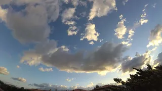 Timelapse clouds & sunrise.