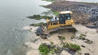 Updating Big Project Develop Lake fill By SHANTUI Bulldozer Pushing Stone to Water & Truck Spreading