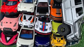 Box Full of Model Cars /Porsche Taycan, Mercedes G550, Toyota Supra, BMW Dtm, Porsche 911 GT3