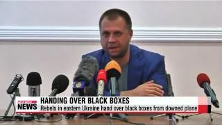 Rebels in eastern Ukraine hand over black boxes to Malaysian investigators