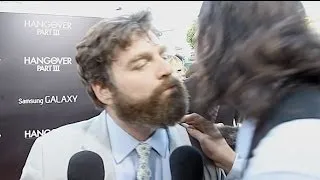 Zach Galifianakis Kisses Greek Reporter during Interview