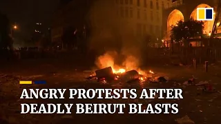 Protesters angry about Beirut blasts call on visiting French leader to push for reforms in Lebanon