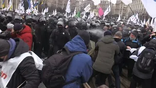 Police clash with anti-lockdown protesters in Ukraine | AFP