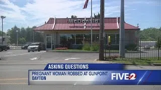 Pregnant woman robbed at gunpoint on her way to work