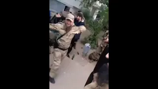 Chechen demobilised soldiers leaving Chechnyia, Russia. dancing Vladimir Putin war cry for Ukraine.