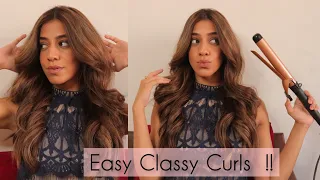 Easiest way to curl your hair with a curling tong.