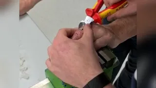Cutting off a wedding ring with a Saw, Dremel & Snips..Ouch!!