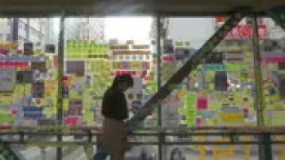 Protesters cover central Hong Kong sites with post-it notes