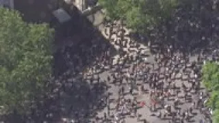 Protesters march past US embassy in London