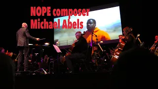 Nope music composer Michael Abels conducts Orchestra and interview. Los Angeles CA November 10, 2022