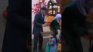 President Biden and first lady Jill Biden welcome trick-or-treaters to the White House