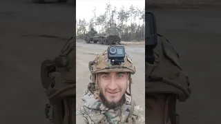 Ukraine - XX.03.2024. Ukrainian Fighter Films Himself With A Swedish Archer SPG In The Background.