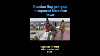 Russian flags being put up in Ukrainian town