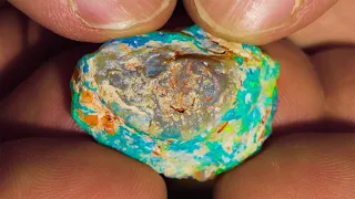 Glowing rough opal has the potential to cut a top gem