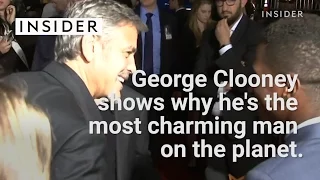 George Clooney steals Sandra Bullock 's spotlight at her own premiere