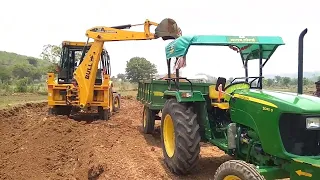 blippi wheel loader playing in the dirt with jcb 3dx loading tractors working on the farm jcb video