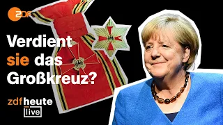 Merkel bekommt Verdienstkreuz: Die umstrittene Verleihung mit Analyse bei ZDFheute live