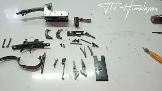 Complete disassembly of shotgun.