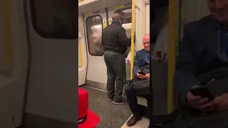 Man sings Bon Jovi's Livin on a prayer on the train