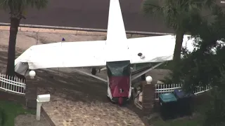 Plane crashes down on Orlando, Florida road; no one hurt