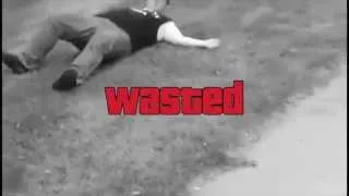 Guy fails at kicking a soccer ball and gets GTA Wasted
