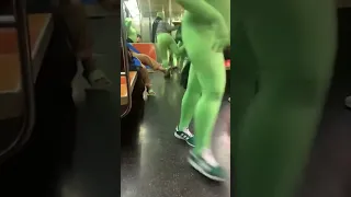Group in green jumpsuits assault 2 women on subway