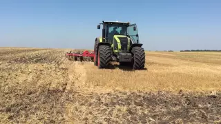 Claas axion 940 with quivogne jupiter 8.1