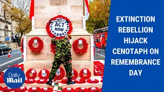 Extinction Rebellion protest: XR hang climate change wreath at Cenotaph on Remembrance Day