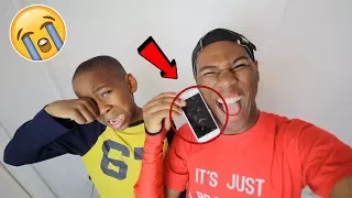 I smashed my little brothers iPhone 7.. **PRANK!** (Backfires)