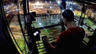 На высоте. Ночная смена на башенном кране. Night work on tower crane.