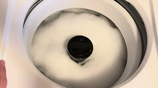 Trying a high sudsing detergent in an HE machine.