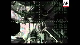 Manned Soyuz spacecraft docks with space station