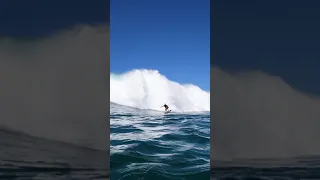 huge honolua bay wave / shot swimming in the water